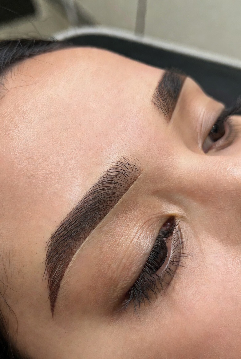 [TEMP AI CONCEPT — NOT FINAL] Cosmetic tattoo treatment at K&K Facial Spa